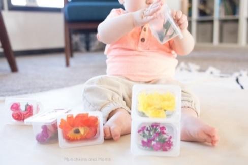A baby sitting on the floor

Description automatically generated with low confidence