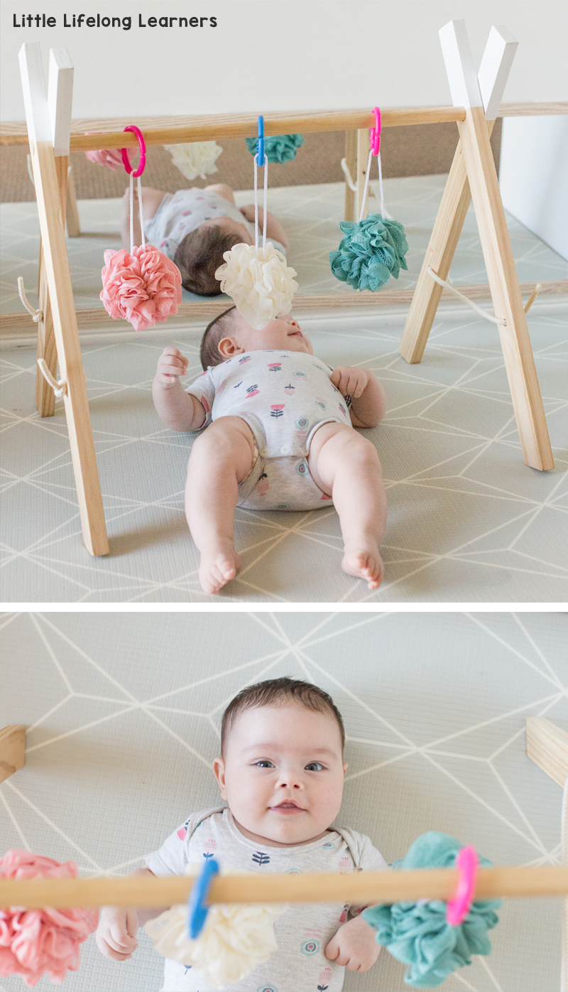 Baby play ideas at 3 months old. Find ideas for your baby play area featuring simple DIY infant and newborn sensory play ideas. Play gyms are a great tool for 3 months and 4 months baby play!